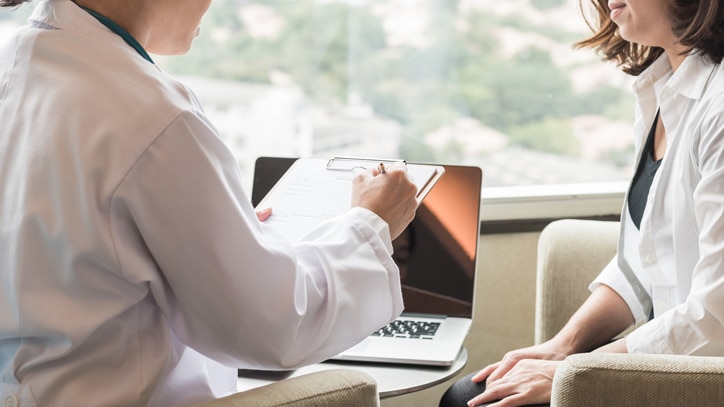 Lady-having-a-health-screening-consultation-with-doctor